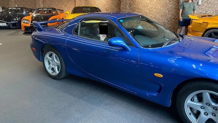 The blue Mazda RX-7 available for rent at MR.HIRO car studio in Osaka, Japan