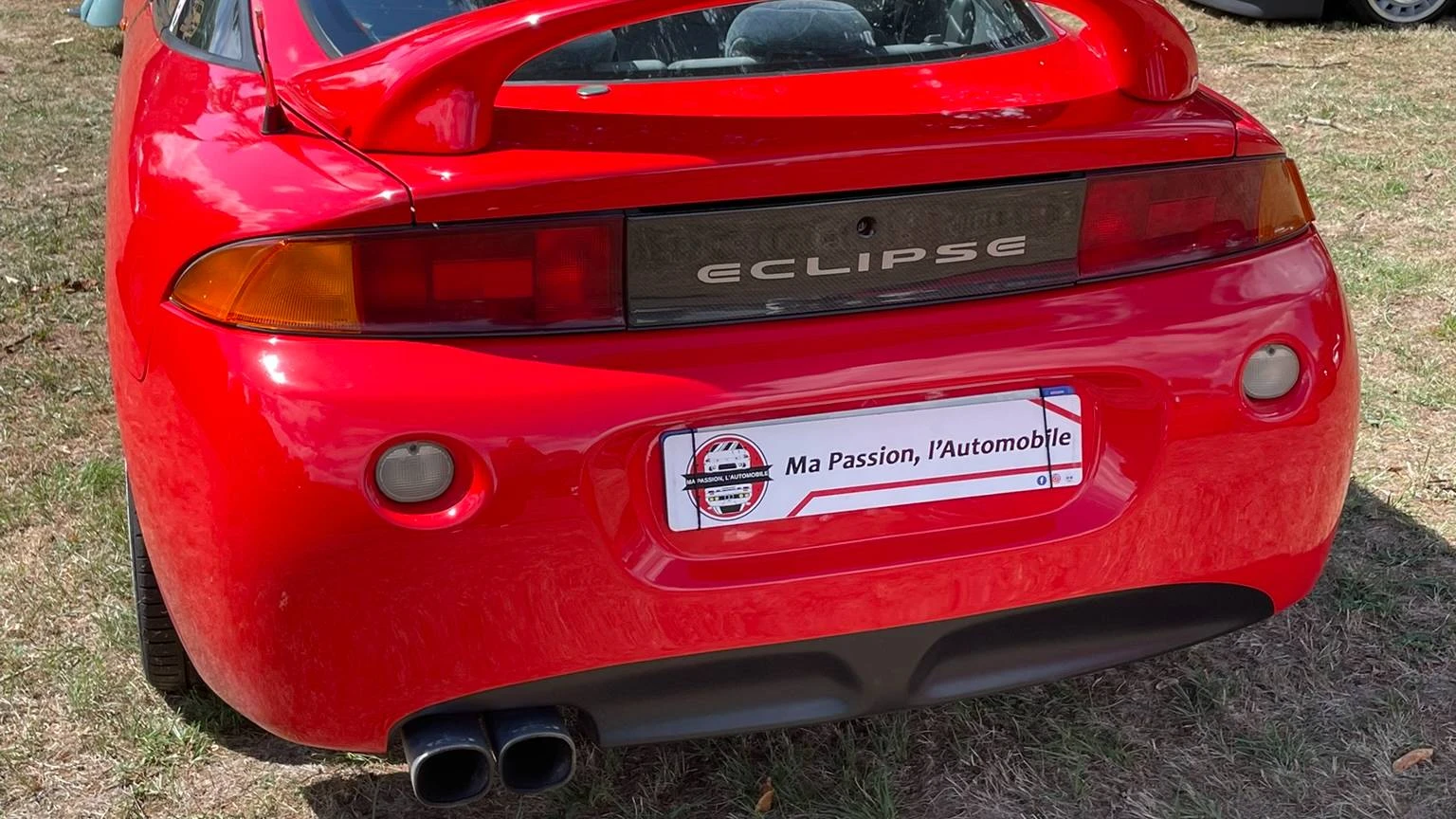 Rear view of a red Mitsubishi Eclipse