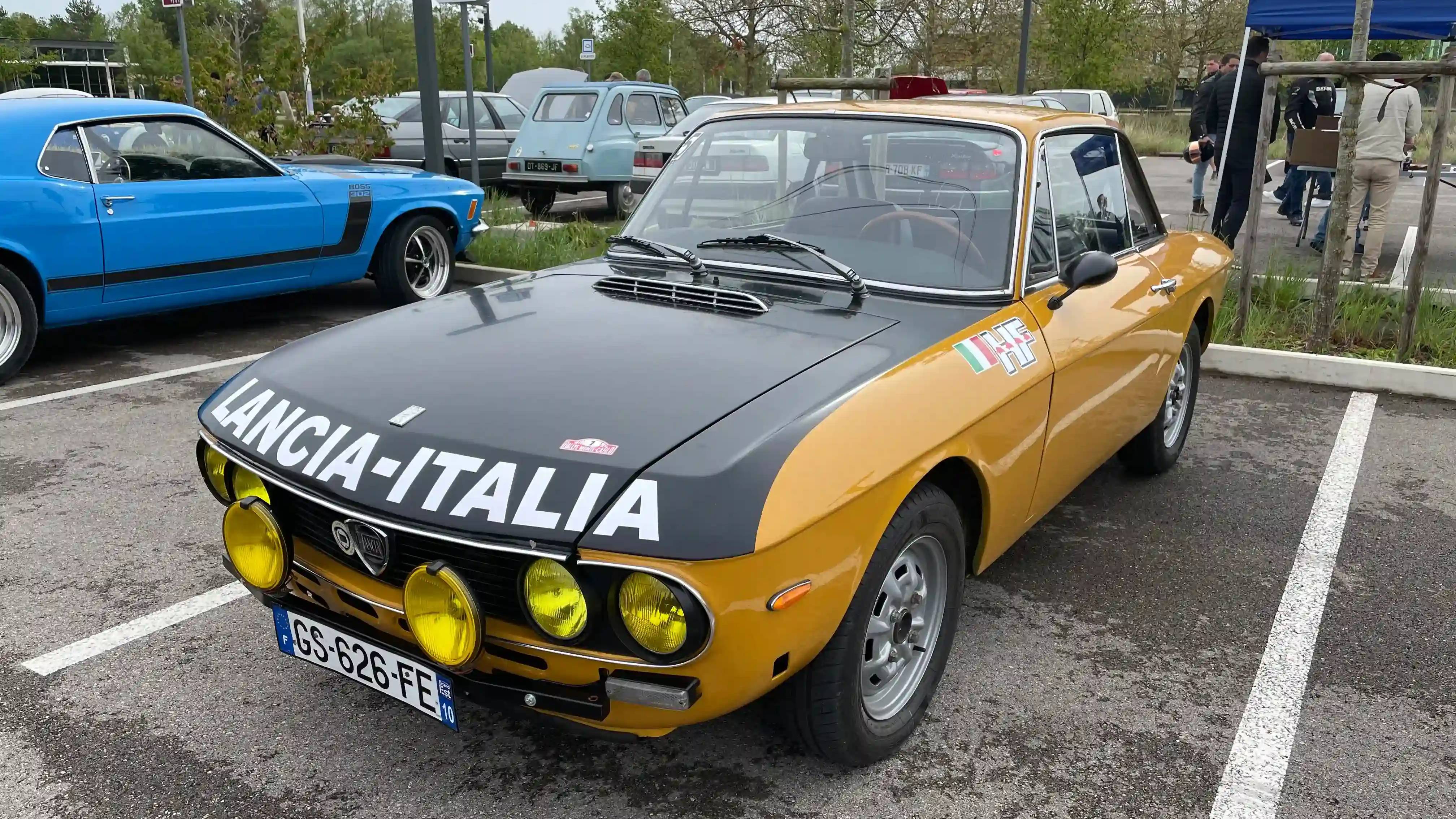 A parked Lancia Fulvia with a Monte Carlo rally livery